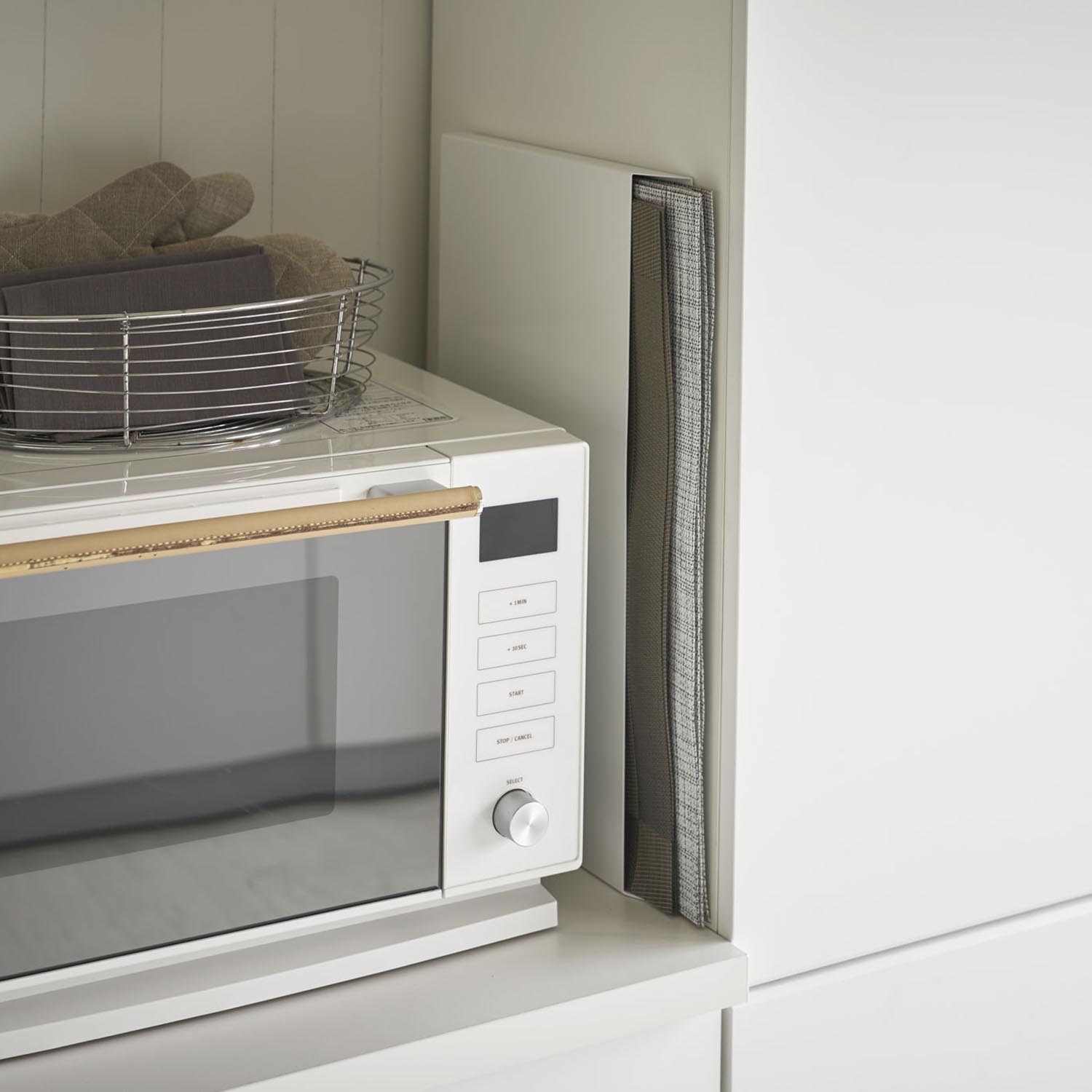 Tower Place Mat Storage
